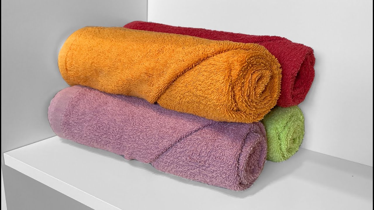 como doblar toallas de baño