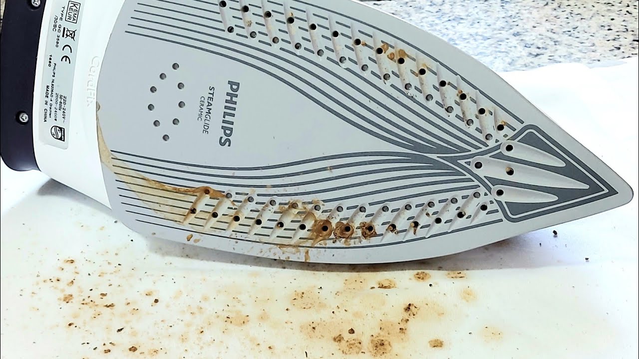 como limpiar una plancha de vapor