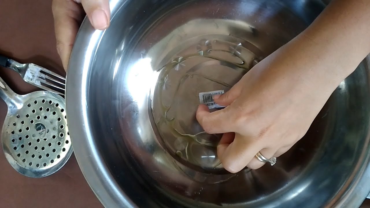como quitar pegamento de etiquetas en metal