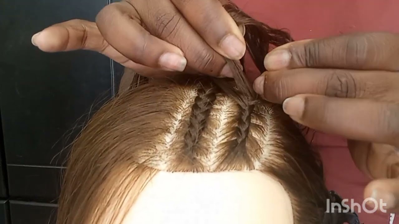 trenzas en el lado de la cabeza