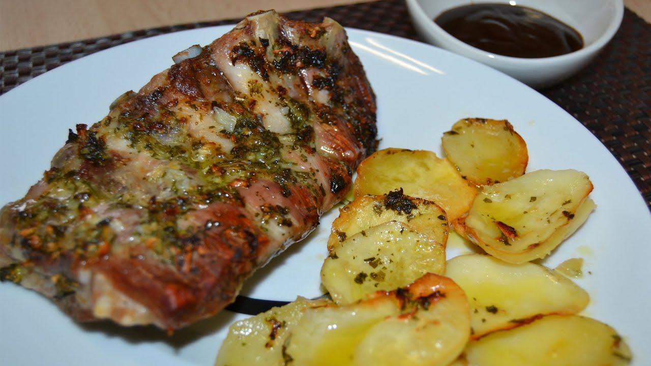 costilla con patatas al horno